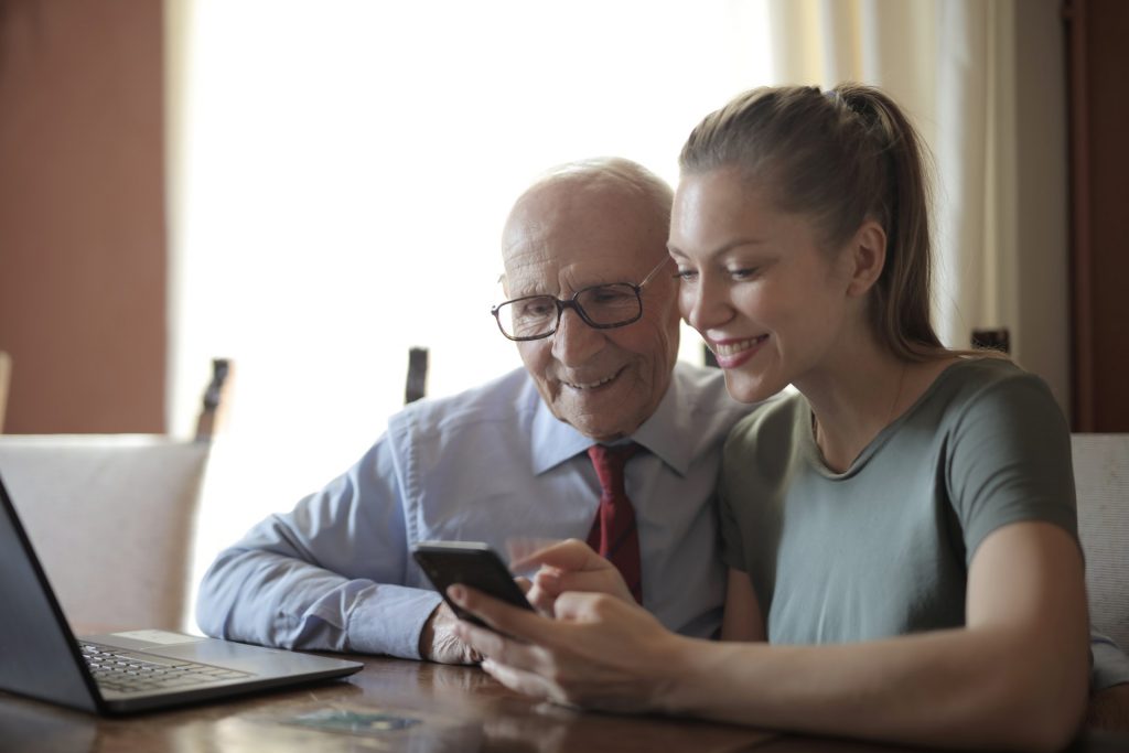 Old man in conversation Hearing loss and depression with north london audiologists