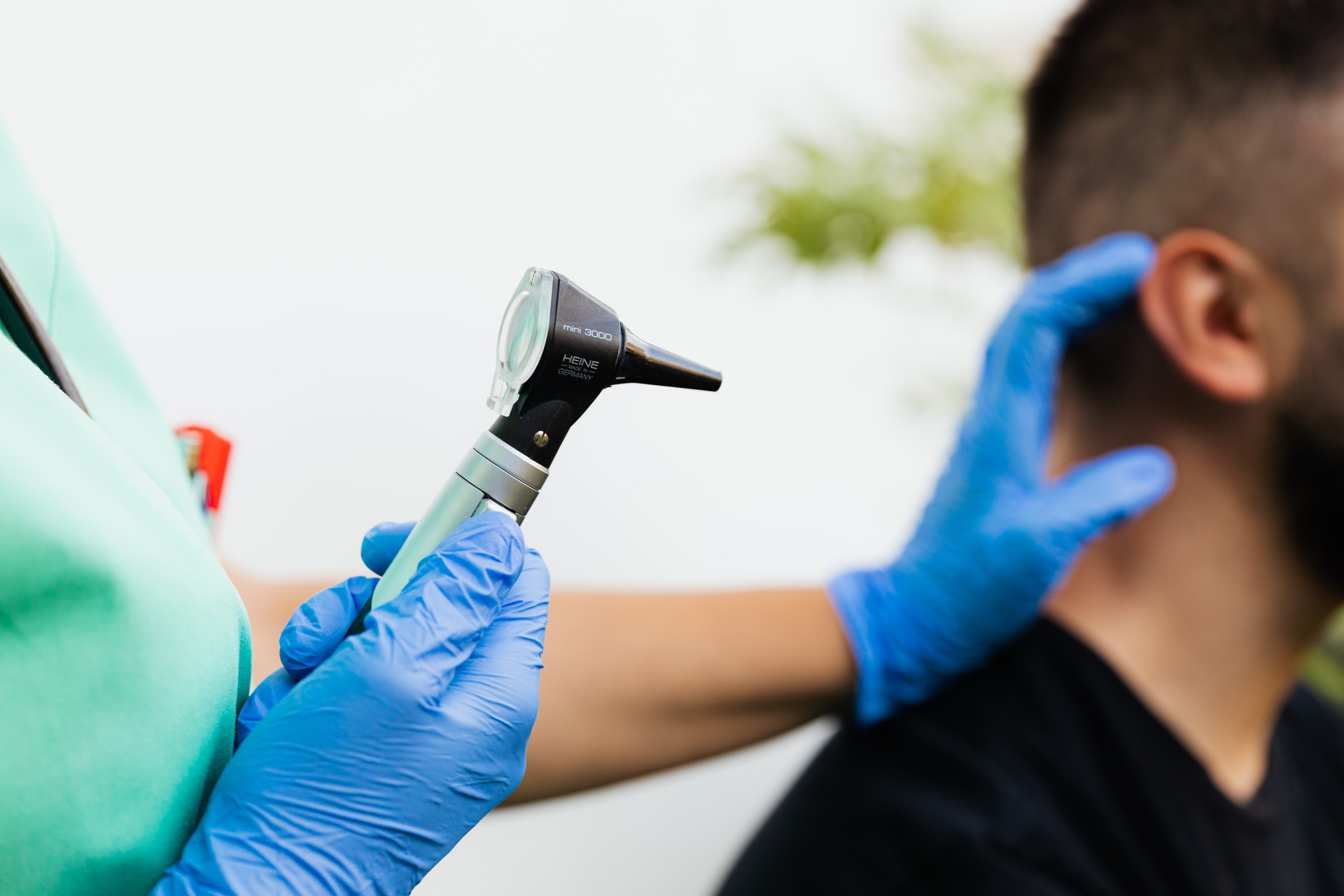 An otoscope used as part of a hearing consultation